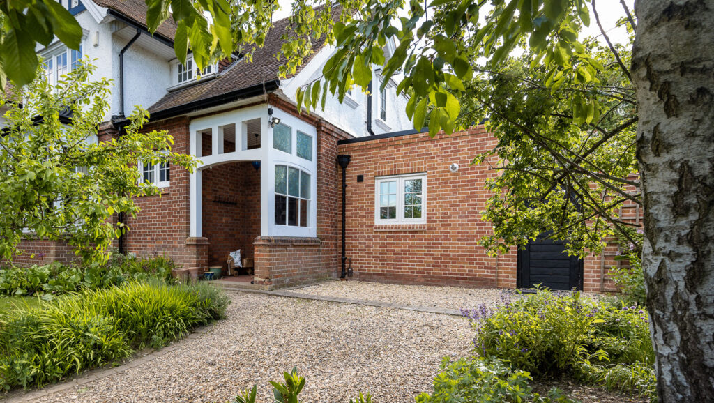 Photo of a house and gravel driveaway
