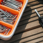 Toolbox with screws and a screwdrivers