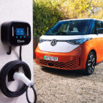 Ohme Home Pro EV charger and orange Volkswagen ID Buzz front