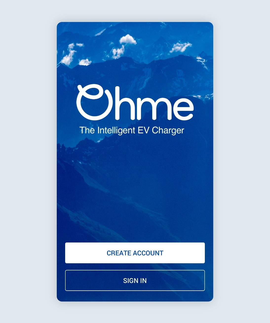 Blue sign in screen with mountains in the background and two buttons to create account or sign in.