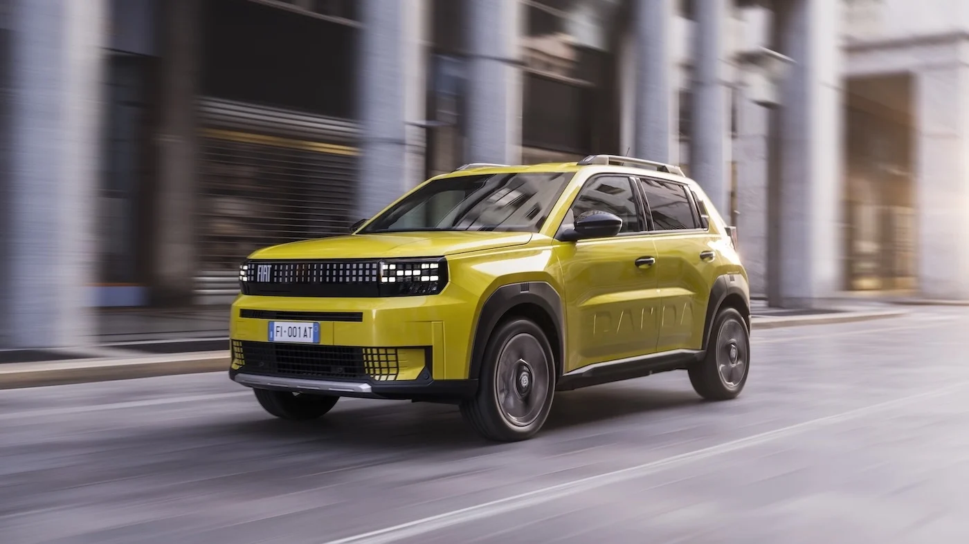 Green Fiat Grande Panda EV driving