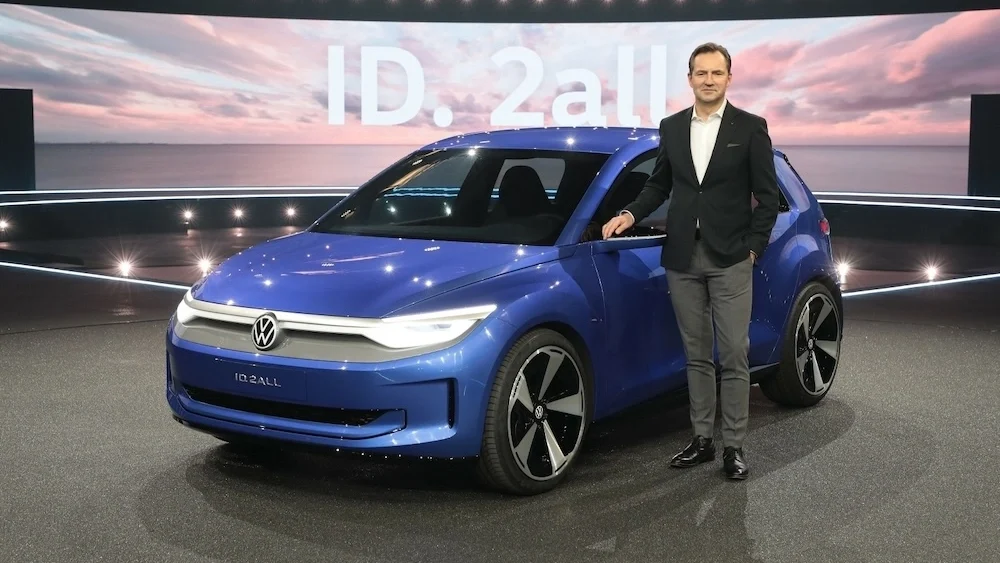 Blue Volkswagen ID2 All with CEO Thomas Schafer